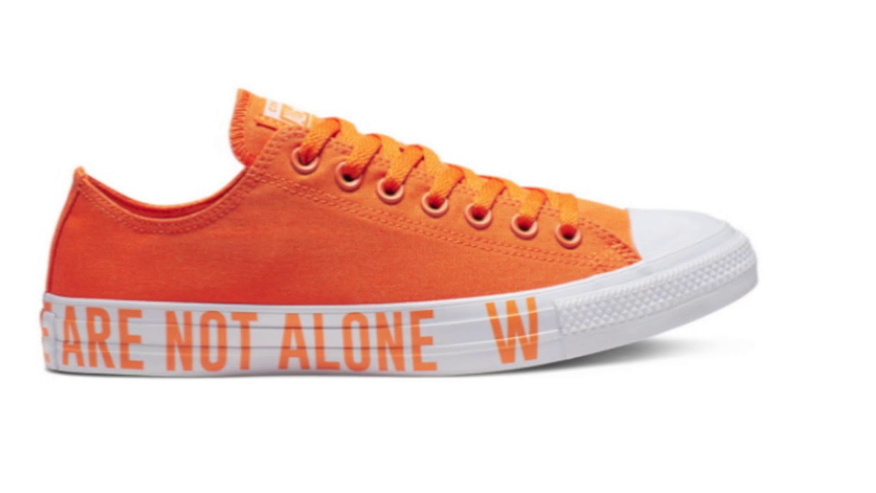 converse we are not alone red