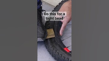 Use a block to remove a tight tire bead.  #shorts #tubeless