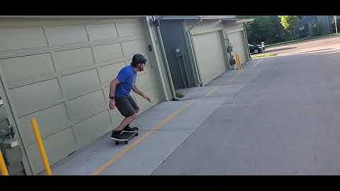 Ray Simmonds skating a pump track driveway in Boulder