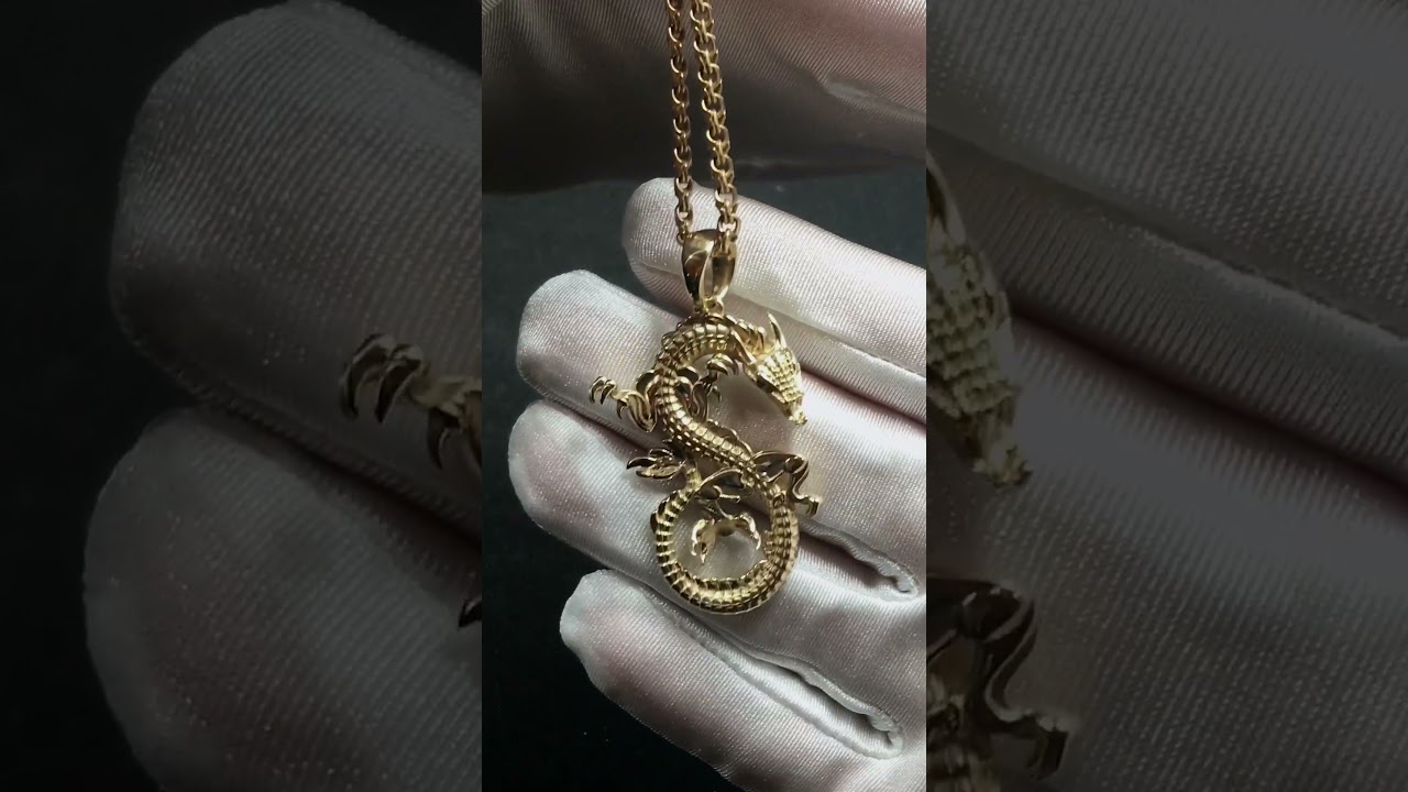 Золотой уроборос: кулон-символ вечного обновления и мудрости. 