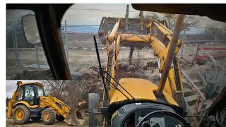Backhoe JCB 3CX -Operator Cab POV Bulldozing After Digging