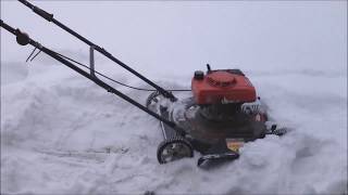 Running lawn mowers as snow blowers...not great.