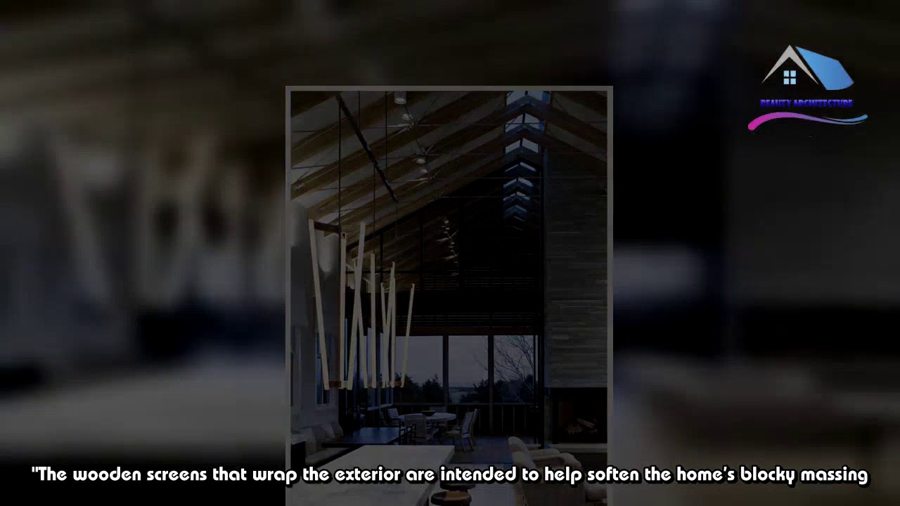 Lights glow through facades of Hamptons home by Leroy Street Studio