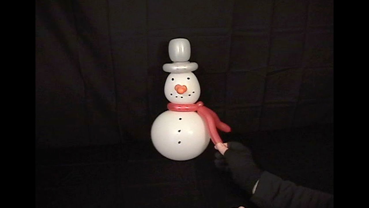 Learn how to make a fun balloon animal snowman using balloon twisting