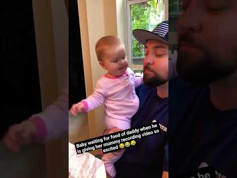 Baby waiting for food of daddy when he is giving her mummy recording video so excited#babylaugh#cute