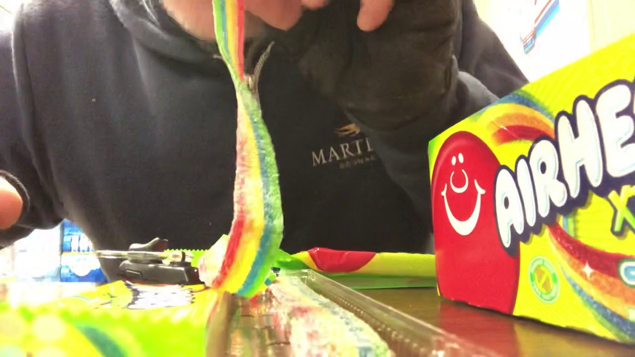 ASMR eating Airheads xtremes candy rainbow berry sour YouTube