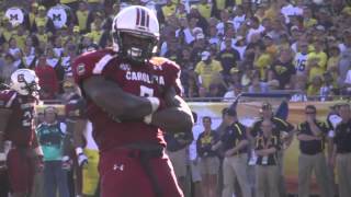 Clowney hit on Michigan's Vincent Smith