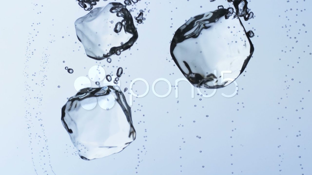 Ice Cubes Falling Into Water stock footage - YouTube