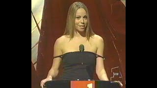Mariah Carey presents Women's wear Designer of the Year, John Galliano @ the 1997 VH1 Fashion Awards