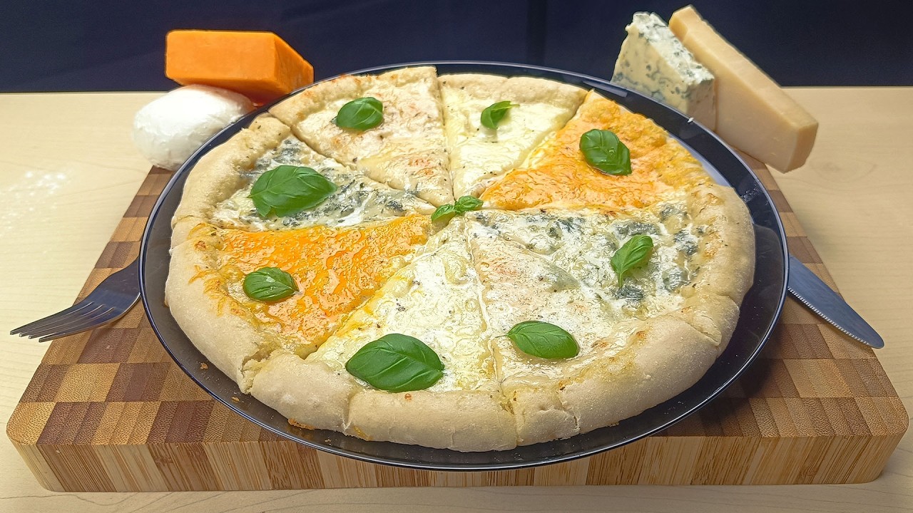 Pizza Quattro Formaggi 🍕🧀  Weiße Pizza mit vier Käsesorten – cremig & unwiderstehlich!