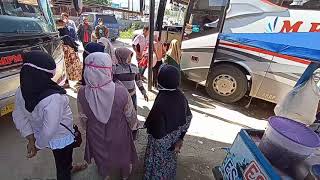 Kesibukan Pool Bus MPM Kota Padang Keberangkatan dan Turunnya Penumpang