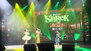 Krystal Kane (center) and the younger iterations of Princess Fiona
