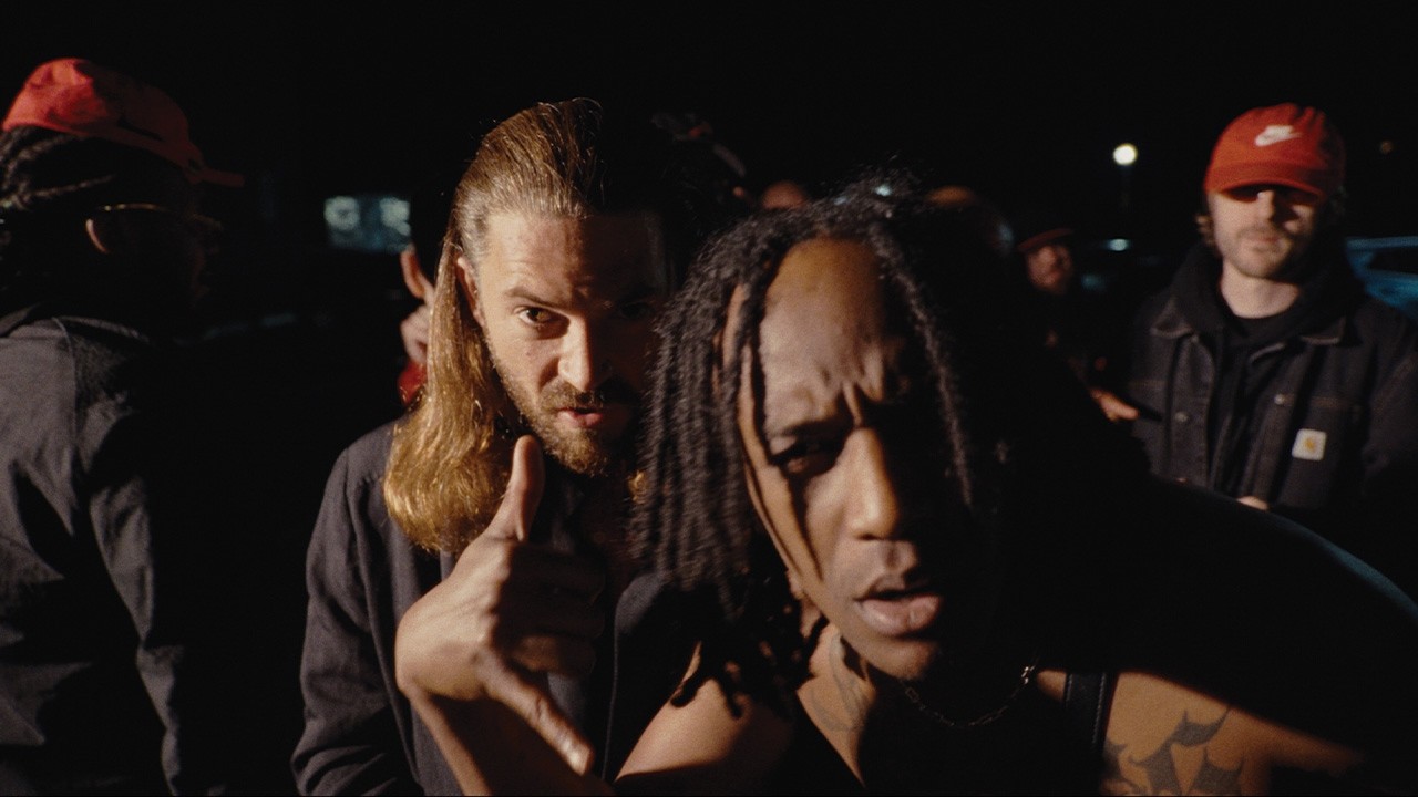 Cult of The Damned - EXT. CAR PARK - NIGHT