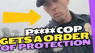 Scared cop get protection order against a girl with a camera