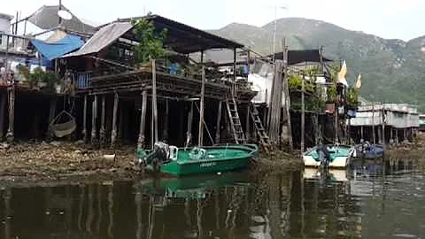 Tai O fishing village ride through the harbor to see stilt houses