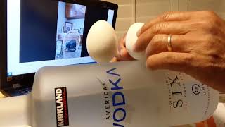 egg balancing eggs la pha It is Hard to stand on a Vodka bottle @2:25 sec.