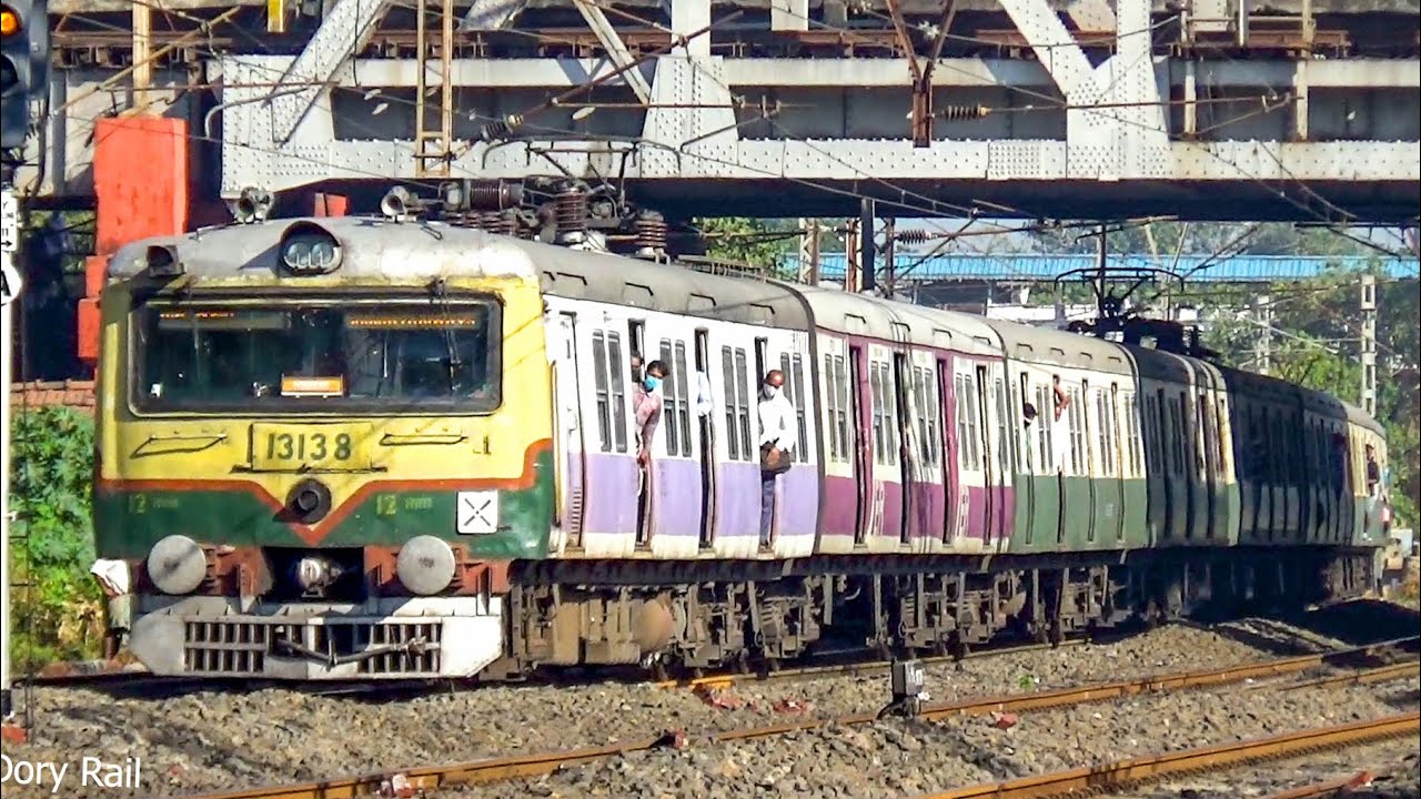 Old green EMU train on curve 