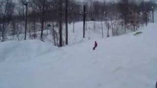 Dukes Devils head snowboarding jump