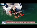 Pursuit suspect attempts to swim away from authorities