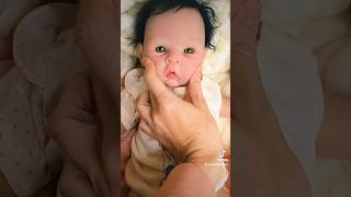 Squishing Cheeks of Silicone Reborn Baby Doll dolls dollcollector