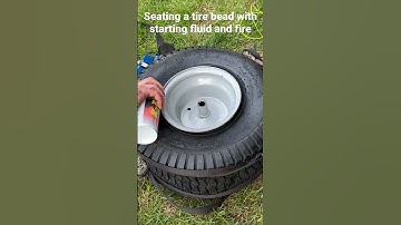 Seating a tire bead with starting fluid and fire