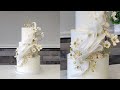 Modern art inspired wafer paper wave cake with wildflowers  bridal expo demo cake  modern cakes