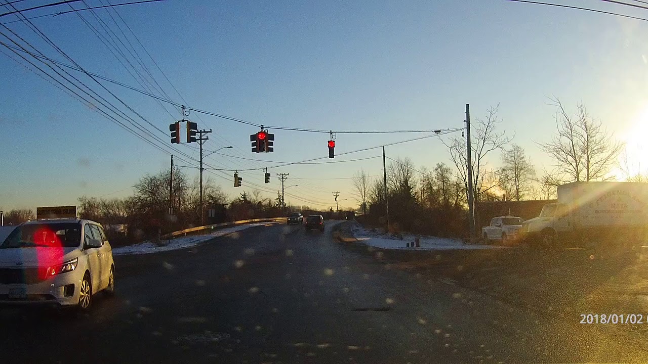 Dashcam captures red light runner - YouTube