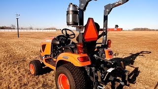 Yeti Rambler One Gallon Jug mounted on a Kubota BX2380