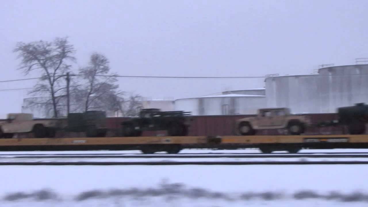 Large amount of military vehicles being transported by train in Oregon