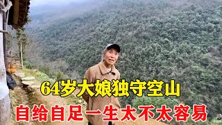 Visiting a single family in the mountains  the 64-year-old woman is alone in the empty mountain. It