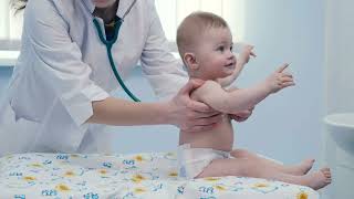 Female doctor listening to a baby with a stethoscope 100% FREE STOCK FOOTAGE