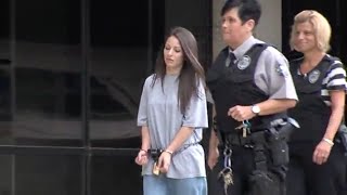 Shackled Prisoner Escorted in Public