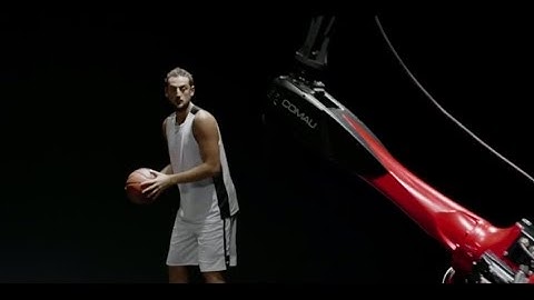 We learn from challenges. Marco Belinelli and Comau Racer robot