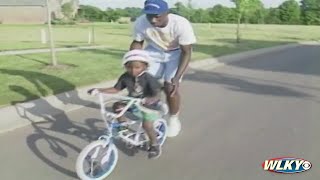 ARCHIVES: UofL great Derek Smith teaches son, Nolan, how to ride a bike