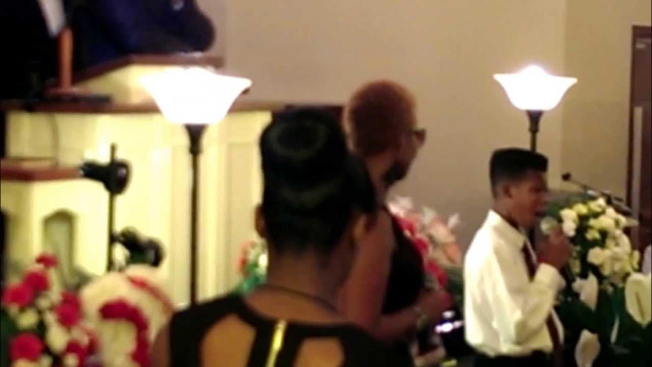 Little brother sings at brothers funeral - YouTube