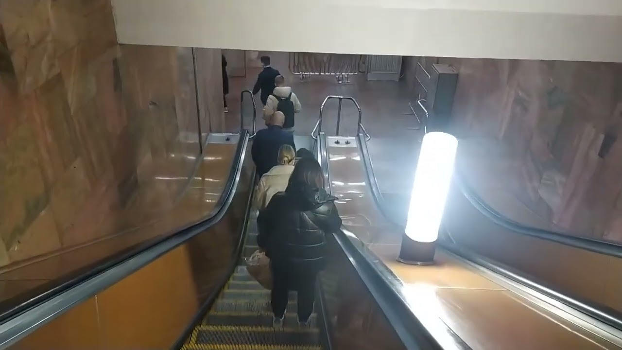 Lubyanka metro station, Moscow, Red Line - interior view, passengers, arrival of the train