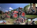 Farmer Girl beim Zuckerrüben hacken mit dem Kubota Traktor