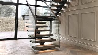 Self supporting steel spine stairs
