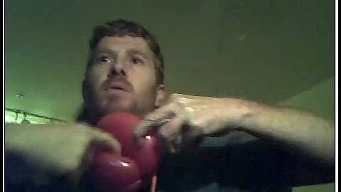 Balloon Twisting character balloons: Elmo look a like by the balloon bandit