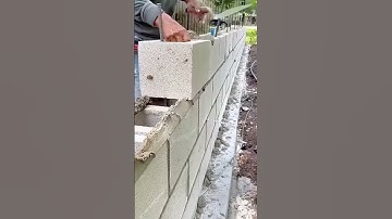 workers build walls with concrete blocks #shorts