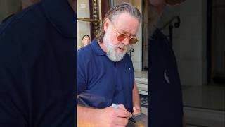 Russell Crowe Warns Fans ‘Don’t Push In On Me’ During Tense Paris Hotel Autograph Session