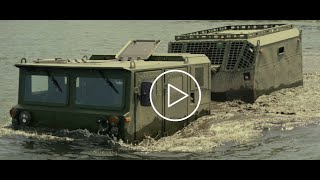 Voyager Defense D12 - Hybrid Electric Tracked Articulated Military Carrier