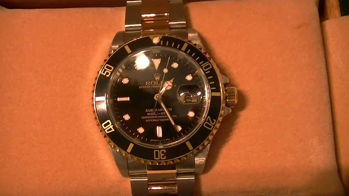 Rolex Submariner sweeping hand and cyclops lens X serial
