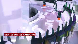 Tölke Robotic Bottle Unscrambler & Integrated Puck Loader
