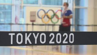 Multiple athletes test positive for COVID-19 just days ahead of start of Olympic Games