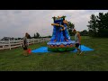 Deflating And Rolling The Inflatable Jaguar Water Slide Deflating And Rolling The Inflatable Jaguar Water Slide