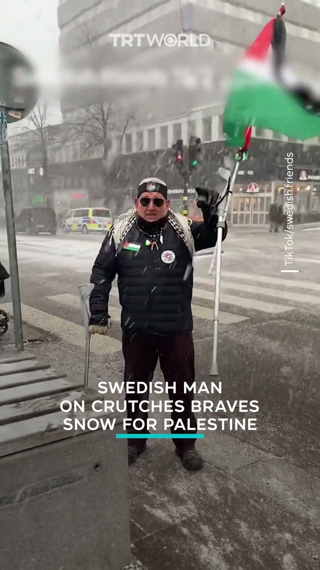 Swedish man on crutches braves snow to protest for Palestine