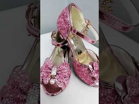 Блестящие туфли розового цвета для девочки на каблуке