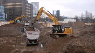 Excavator CAT truck loaded construction site and smooth subsoil