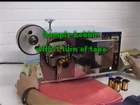 TP-01 machine applies insulation tape to wound coils.